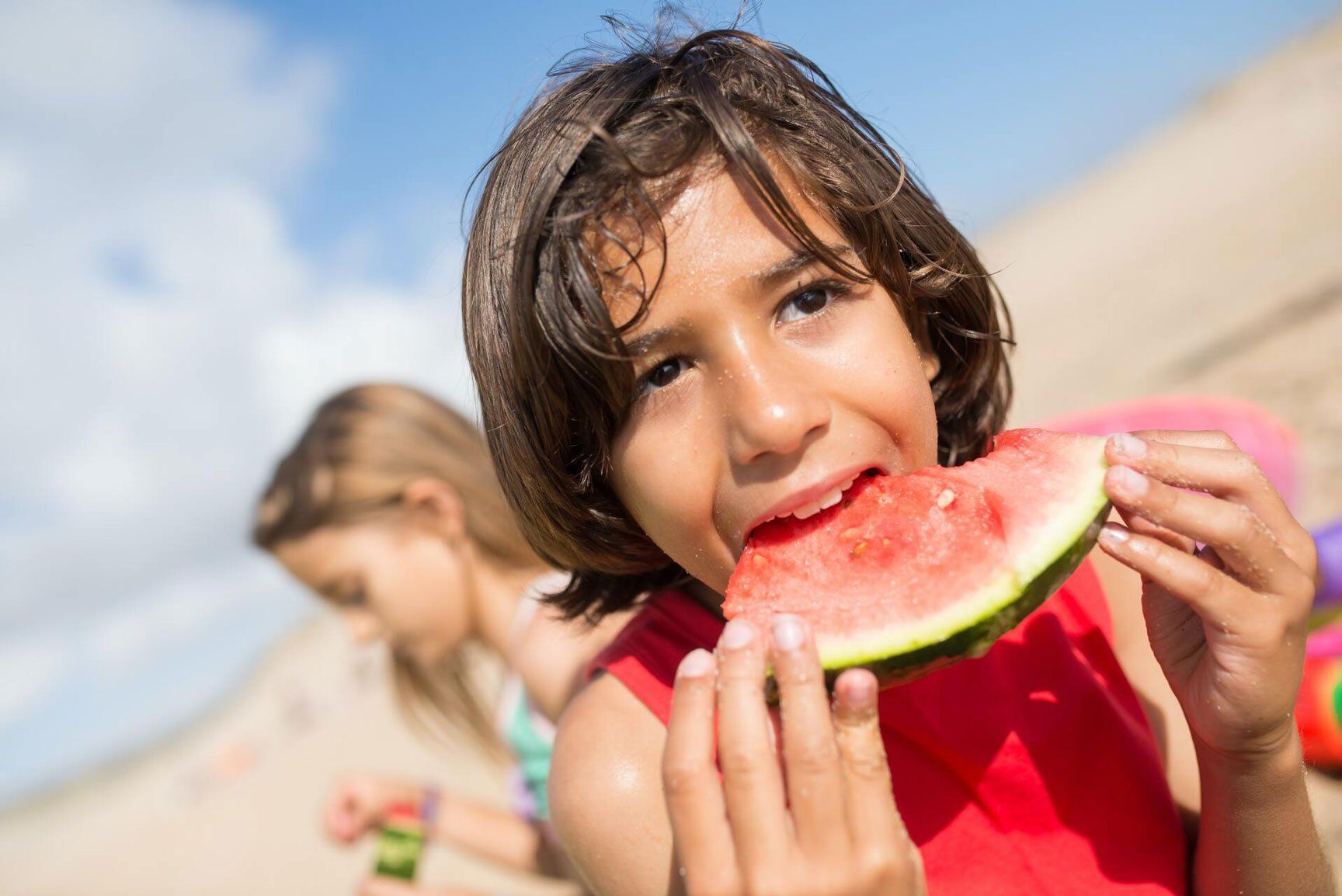 Boy Eating Watermelon – Cruz Davis Family & Cosmetic Dentistry