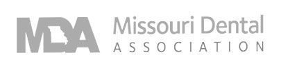 A black and white logo for missouri dental association