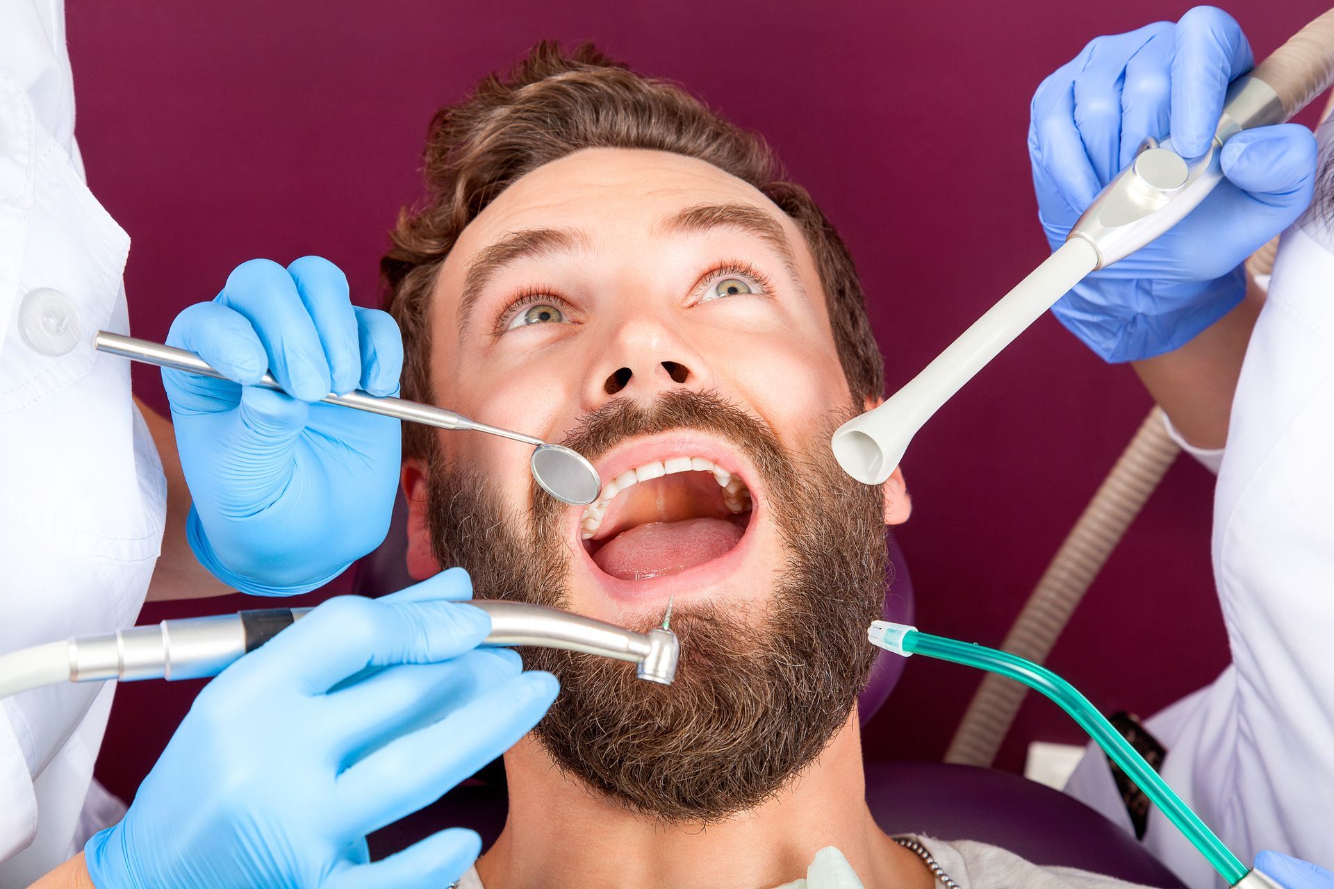 A man about to receive restorative dental services at Dental Care Associates in Ponchatoula, LA, imp