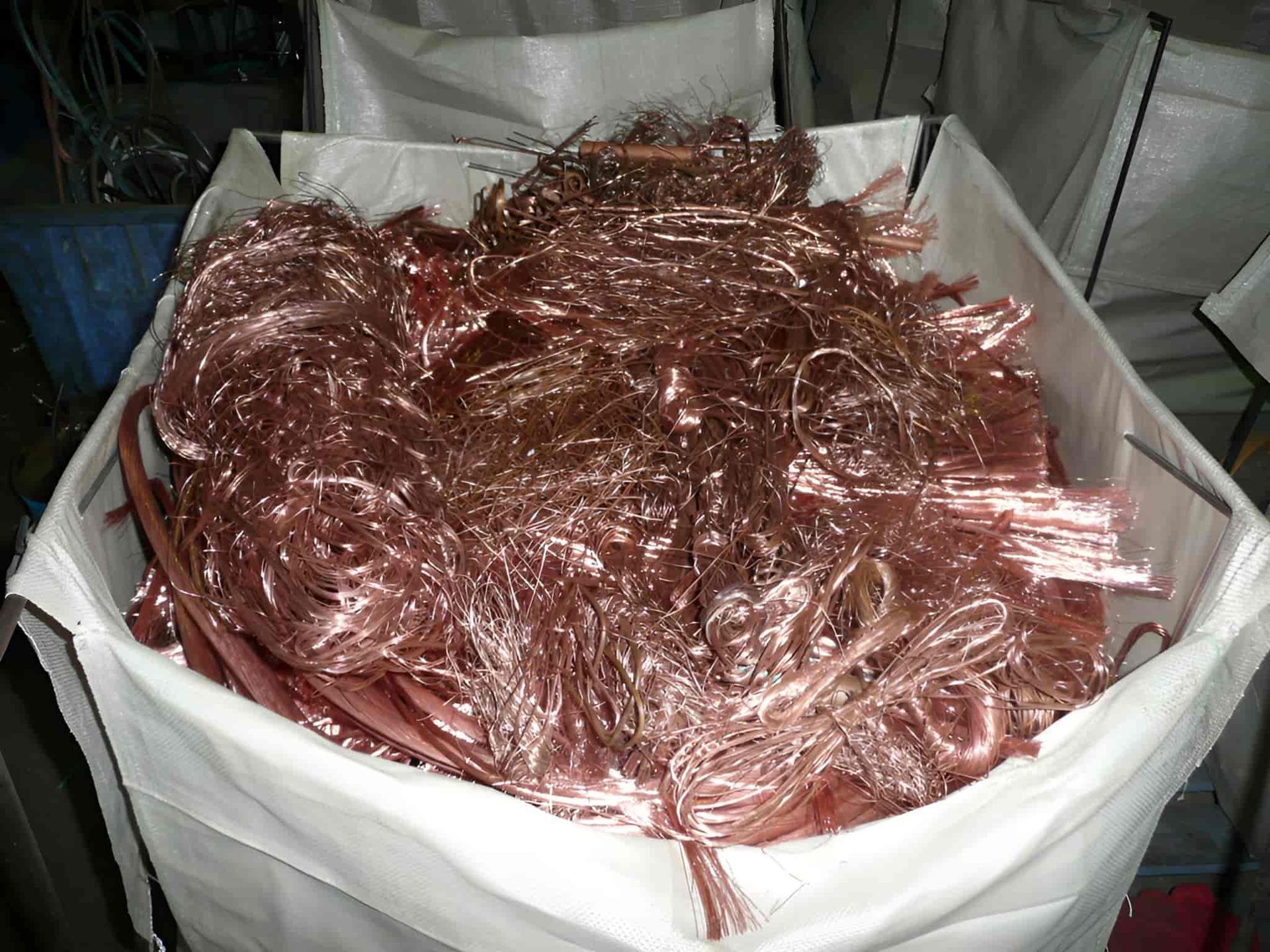A White Bag Filled With A Pile Of Copper Wire — North Queensland Recycling Agents In Bungalow, QLD