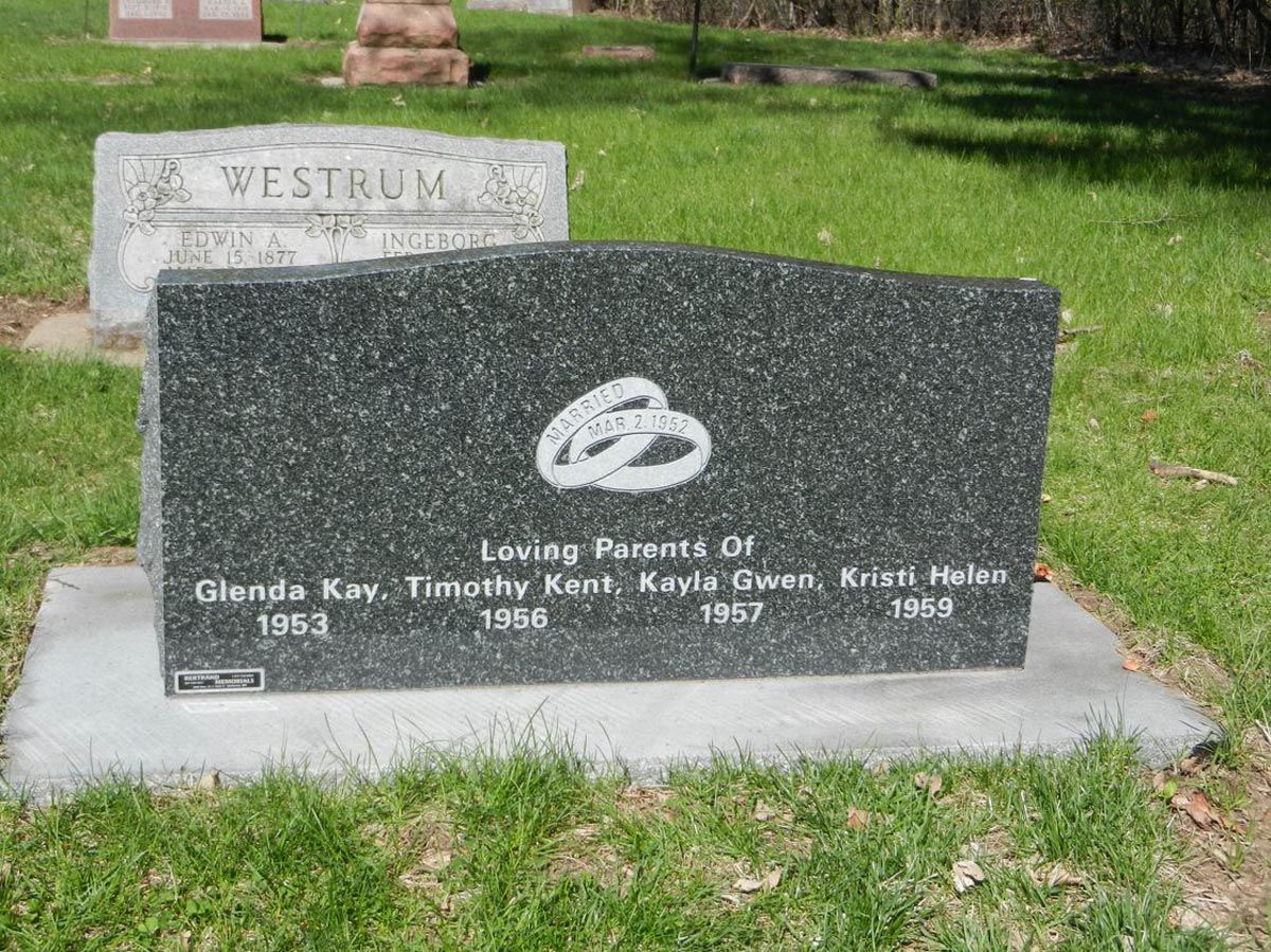 A grave in a cemetery with the name westrum on it