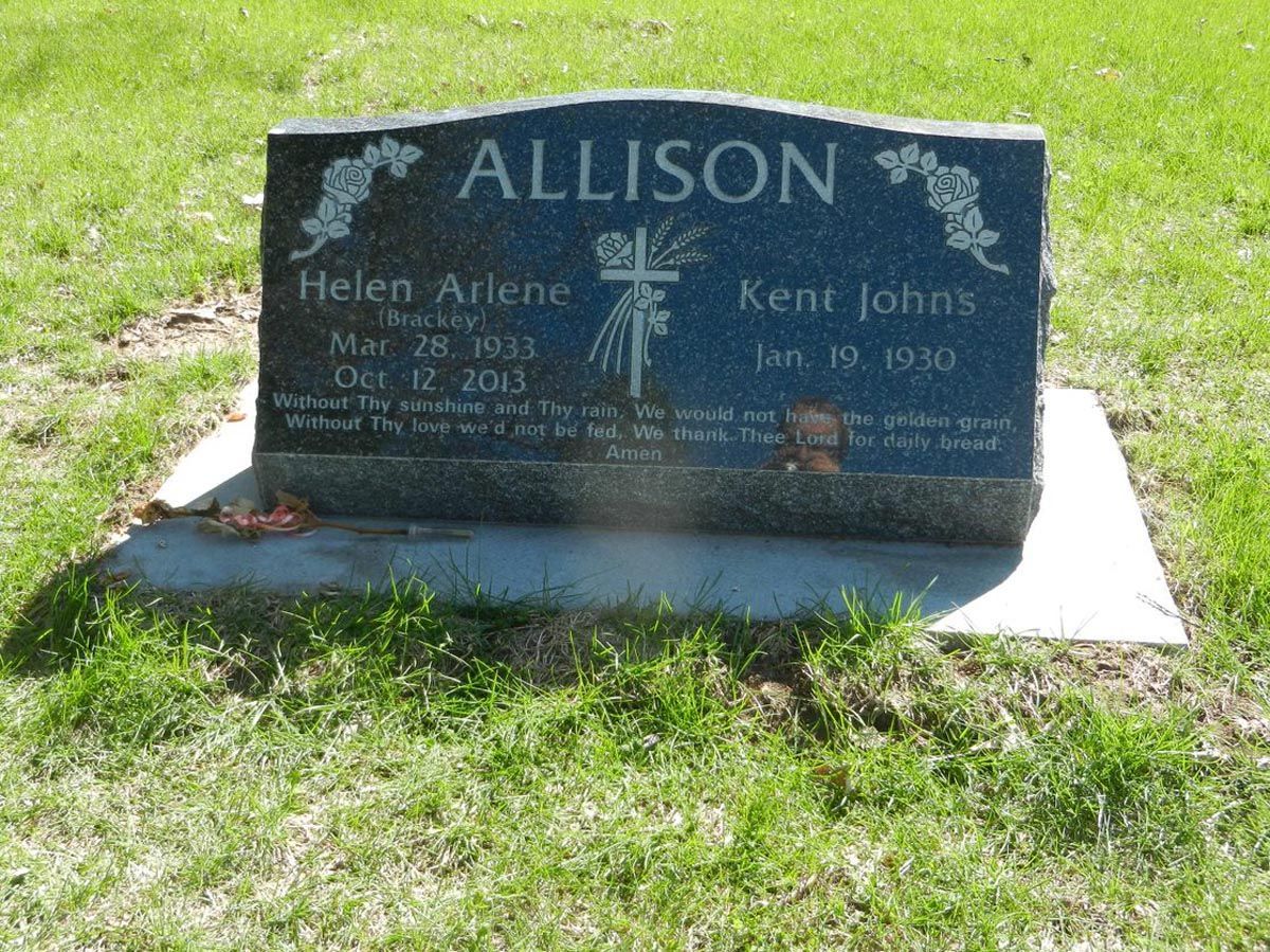 A black gravestone with the name allison on it
