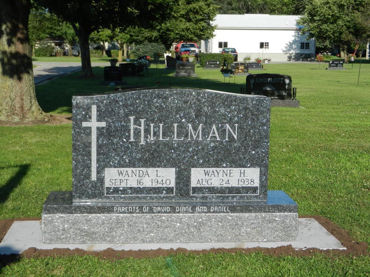 A gravestone with the name hillman on it