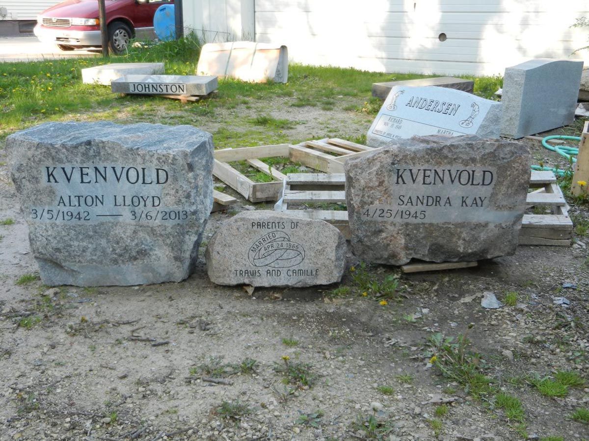 A couple of gravestones with the names kvenvold on them