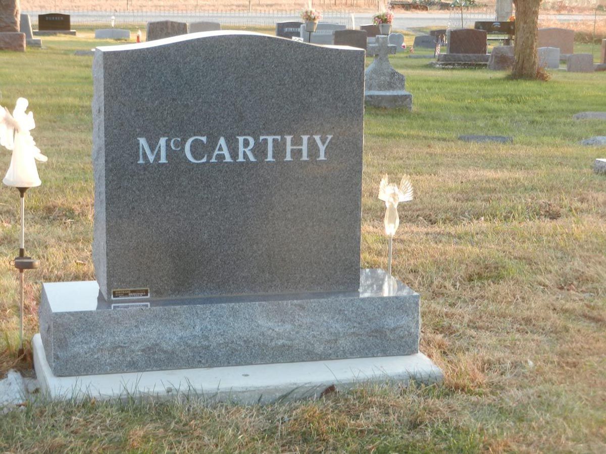 A gravestone for mccarthy in a cemetery