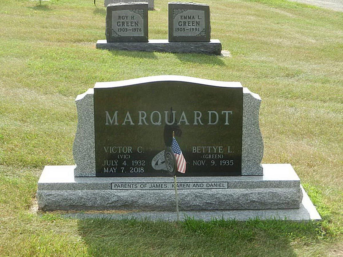 A gravestone for marquardt in a cemetery