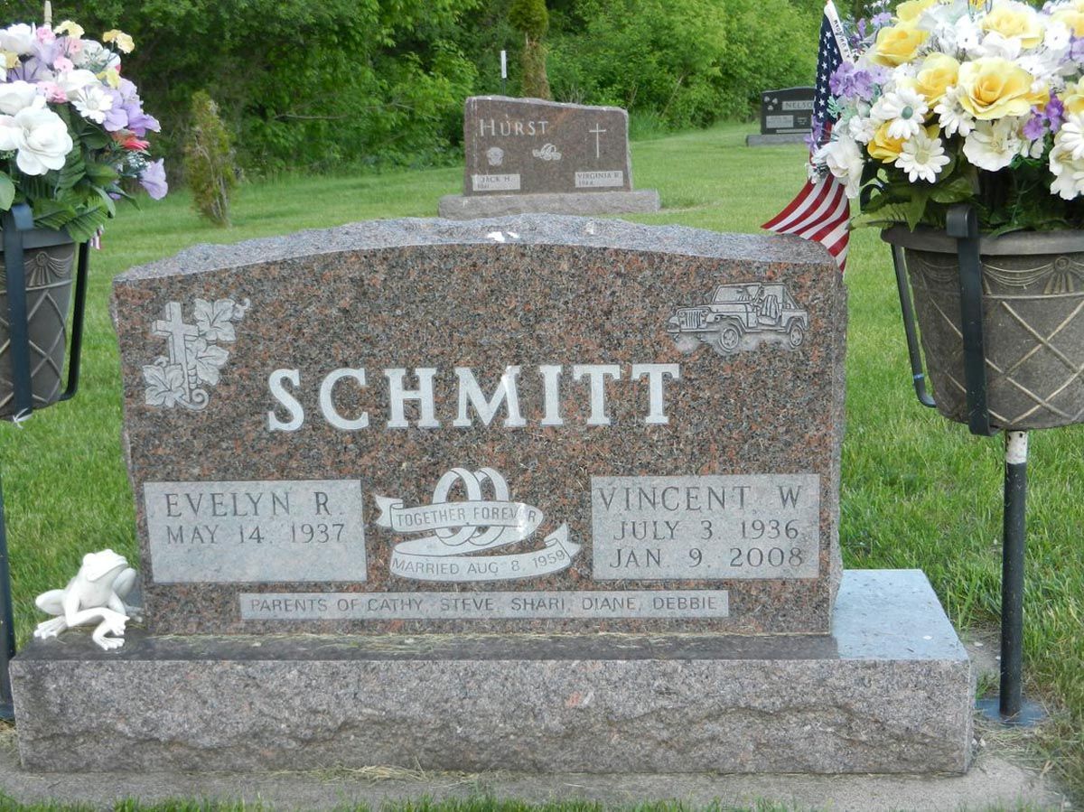 A gravestone with the name schmidt on it