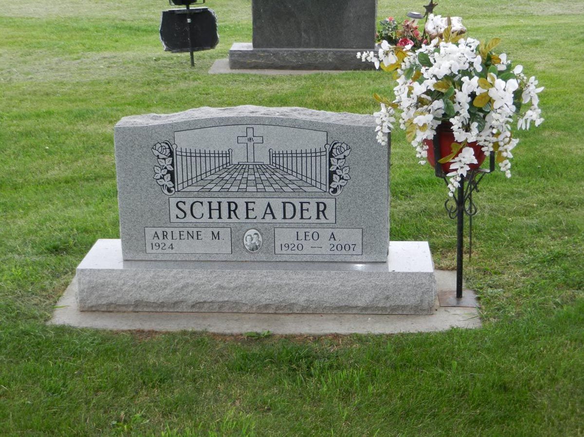 A gravestone in a cemetery with the name schirlader on it