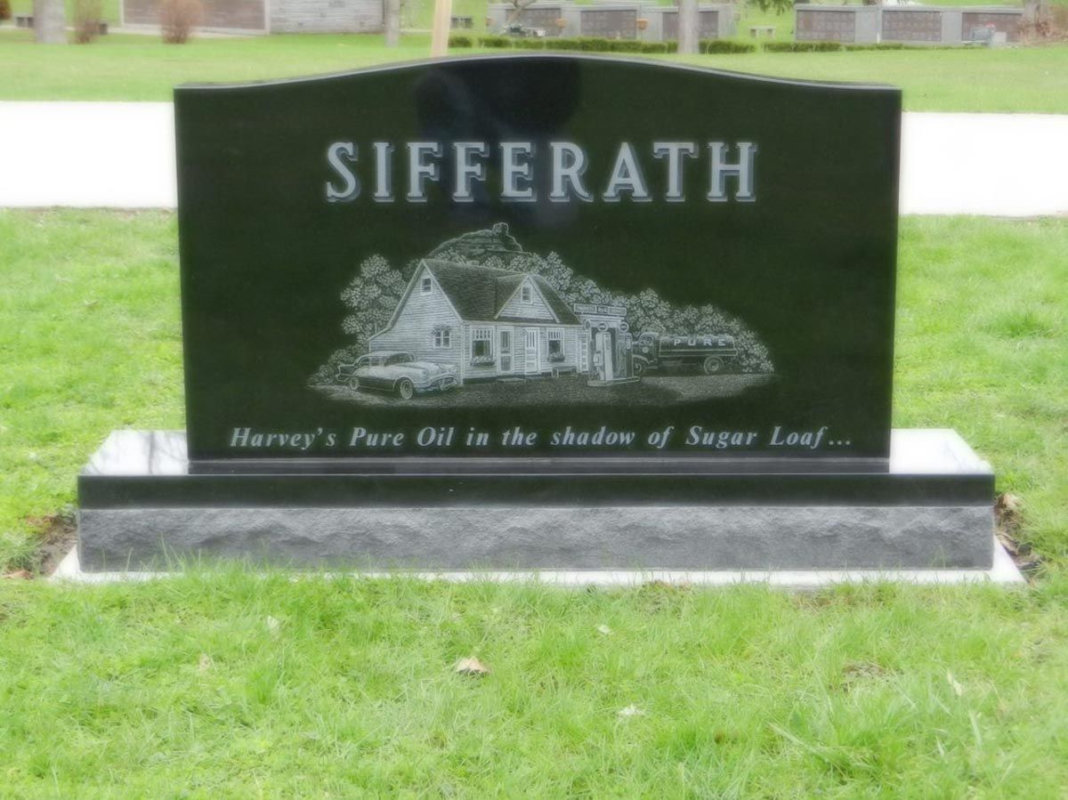 A black gravestone with the name sifferath on it