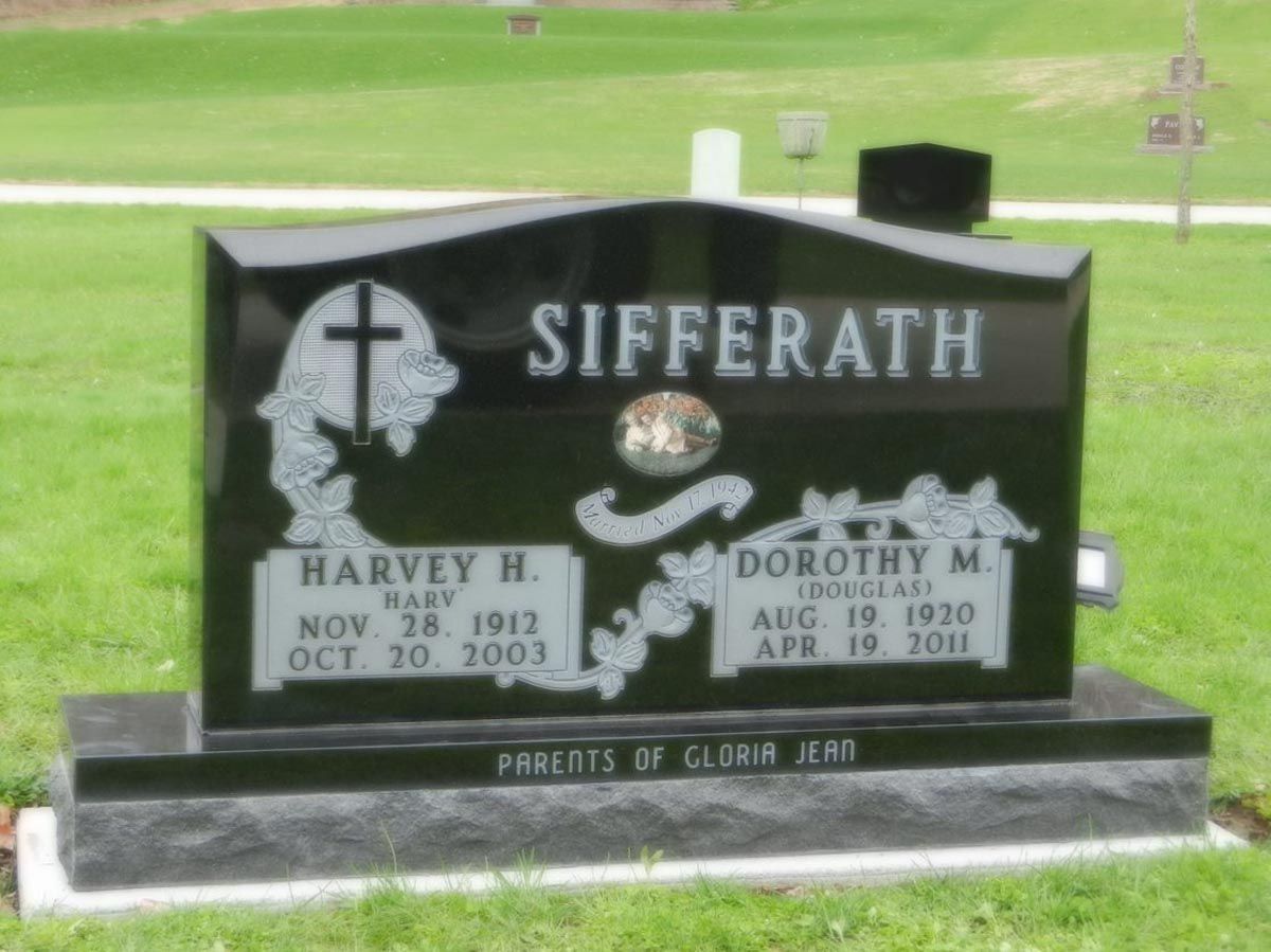 A black gravestone with the name sifferath on it