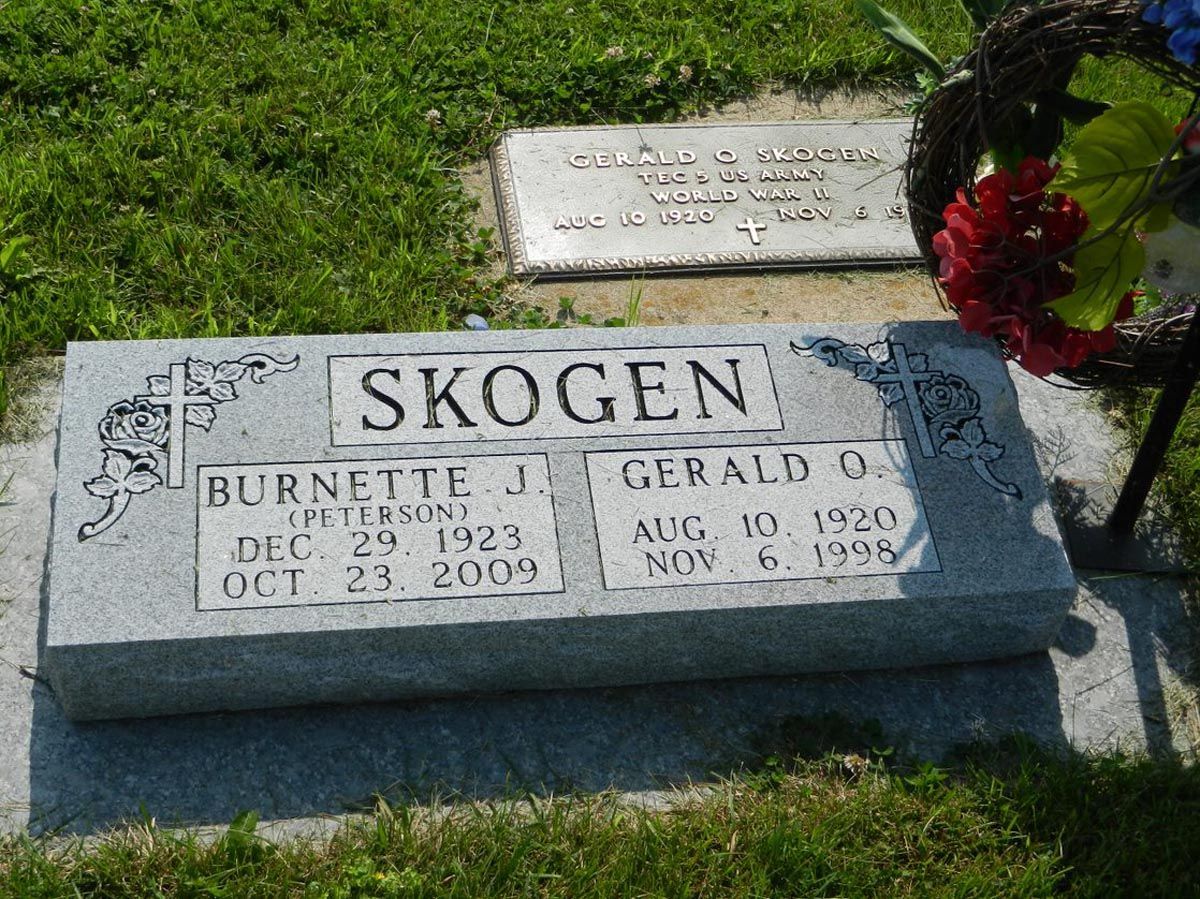 A gravestone with the name skogen on it