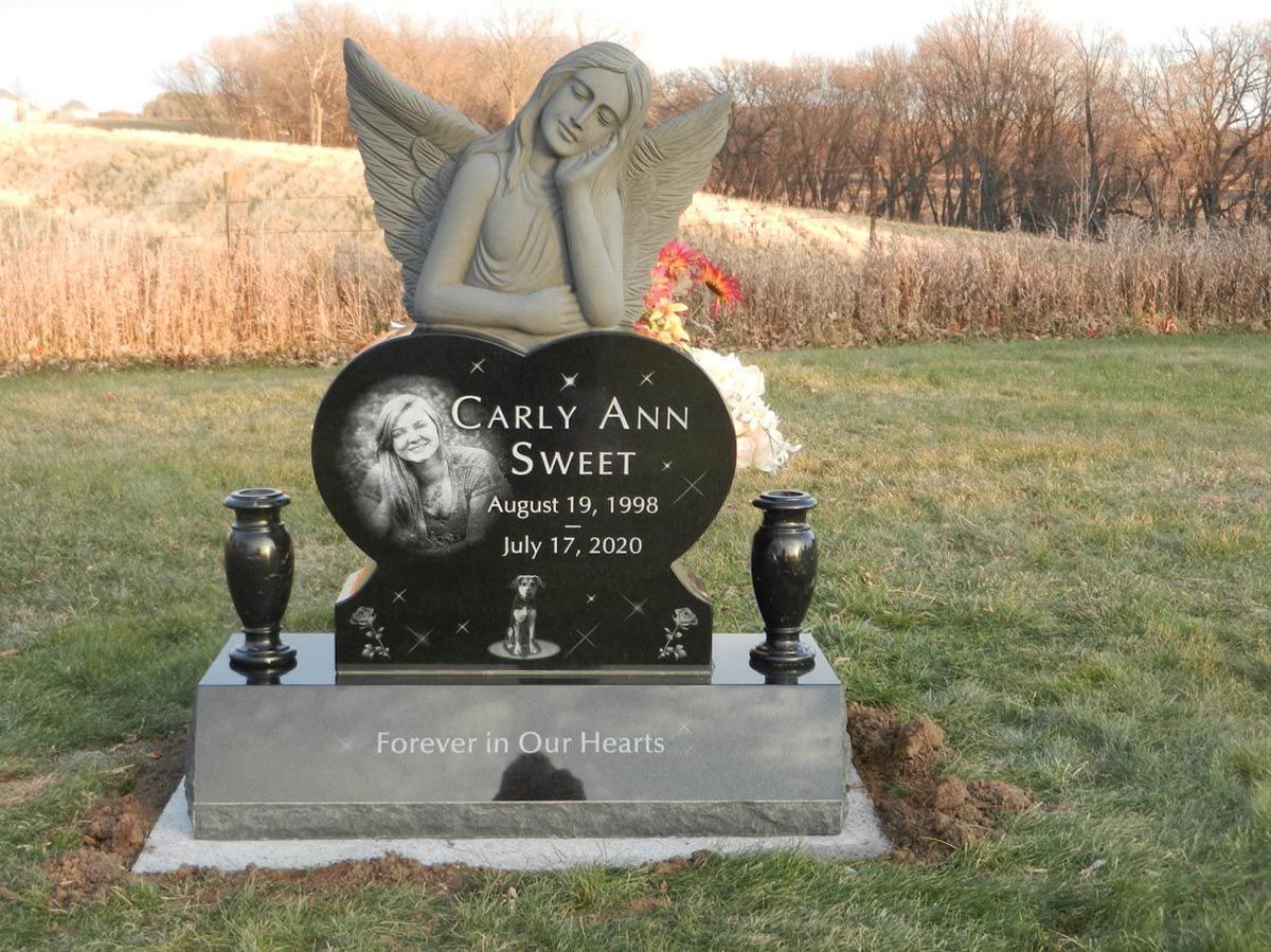 A gravestone for a girl named carly ann sweet