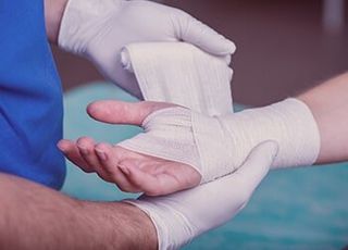 Hand Being Bandaged – Personal Injury in Oak Forest, IL