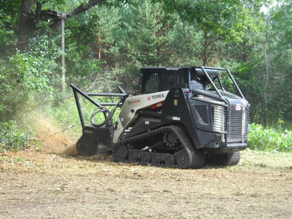 Efficient land clearing, minimal ground disturbance ? The ASV PT-120 cuts through brush