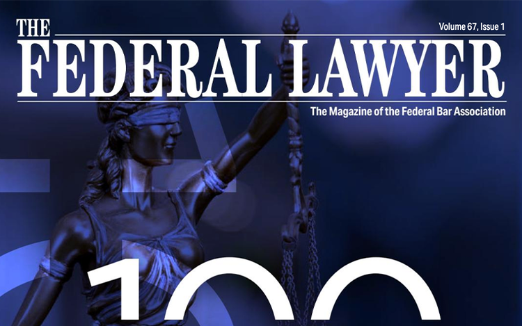 A statue of lady justice is on the cover of the federal lawyer magazine.