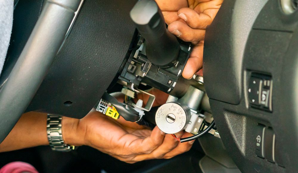 Professional Locksmith Doing Car Rekeying for the Ignition