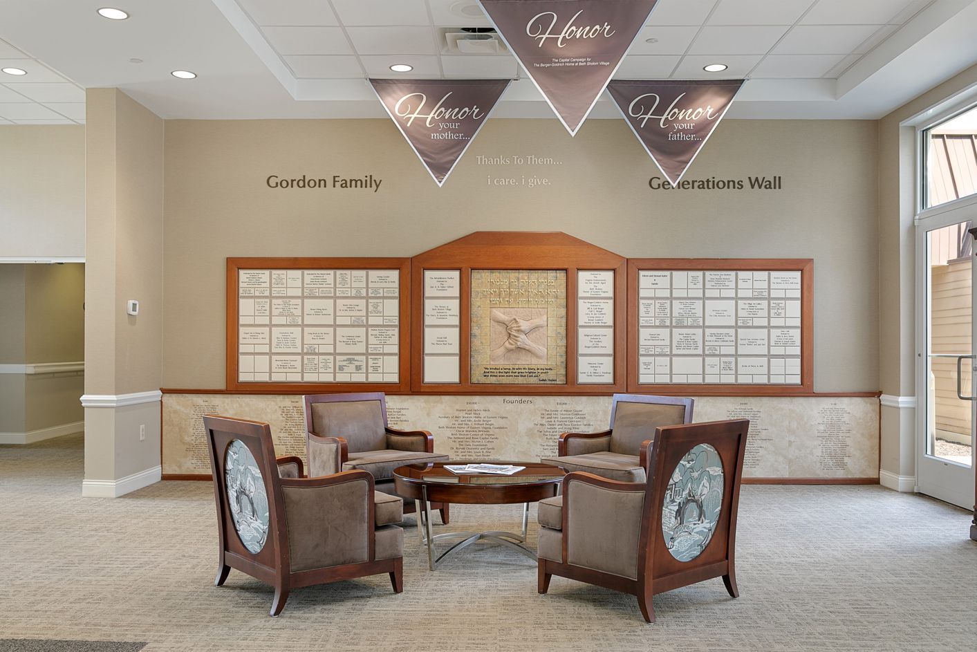A living room with chairs , a table.