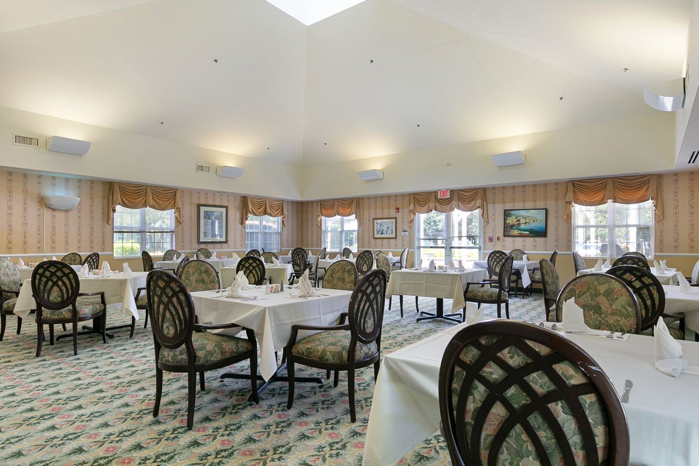 A large dining room filled with tables and chairs.