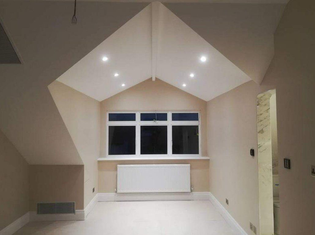 Picture of a loft conversion painted in white by Painters and Decorators Derby
