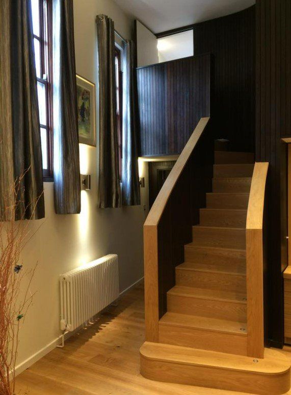 A picture of a staircase painted by Painters and Decorators Derby