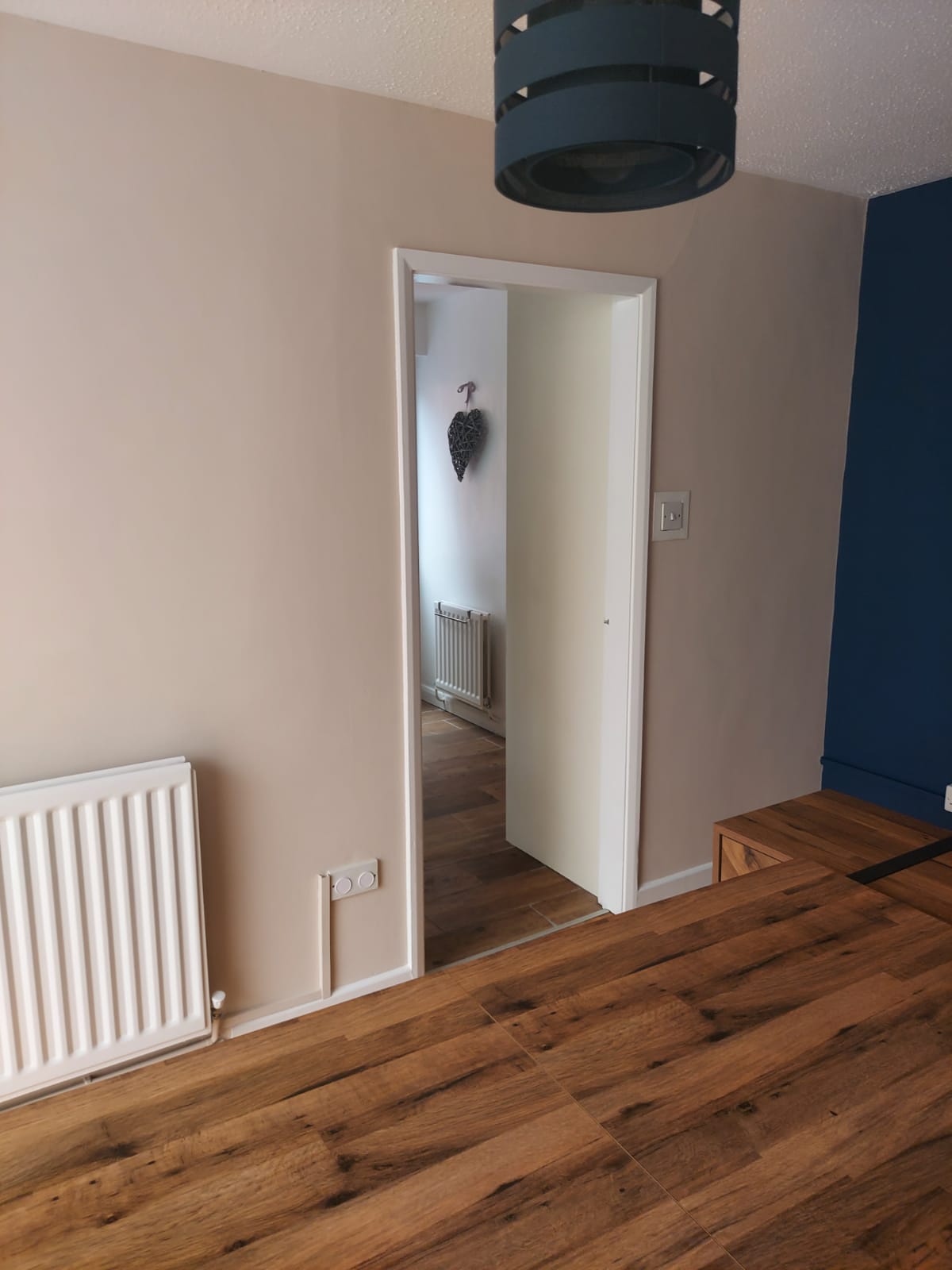 A picture of a living room painted in off white painters and decorators derby