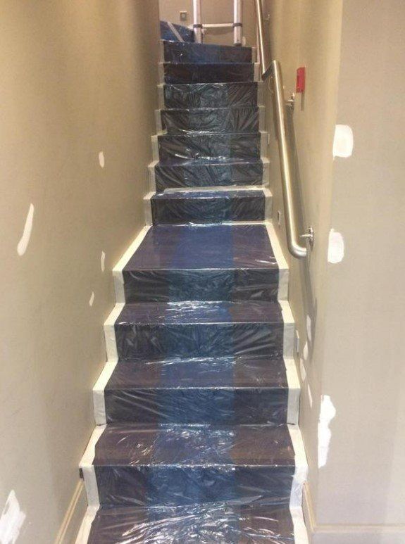 Picture of staircase in the process of being painted by painters and decorators Derby