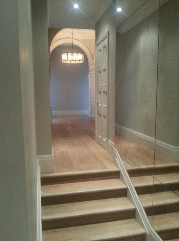 Picture of a domestic hallway painted in light grey by painters and decorators Derby