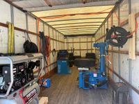 Interior of a mobile tire shop with tools