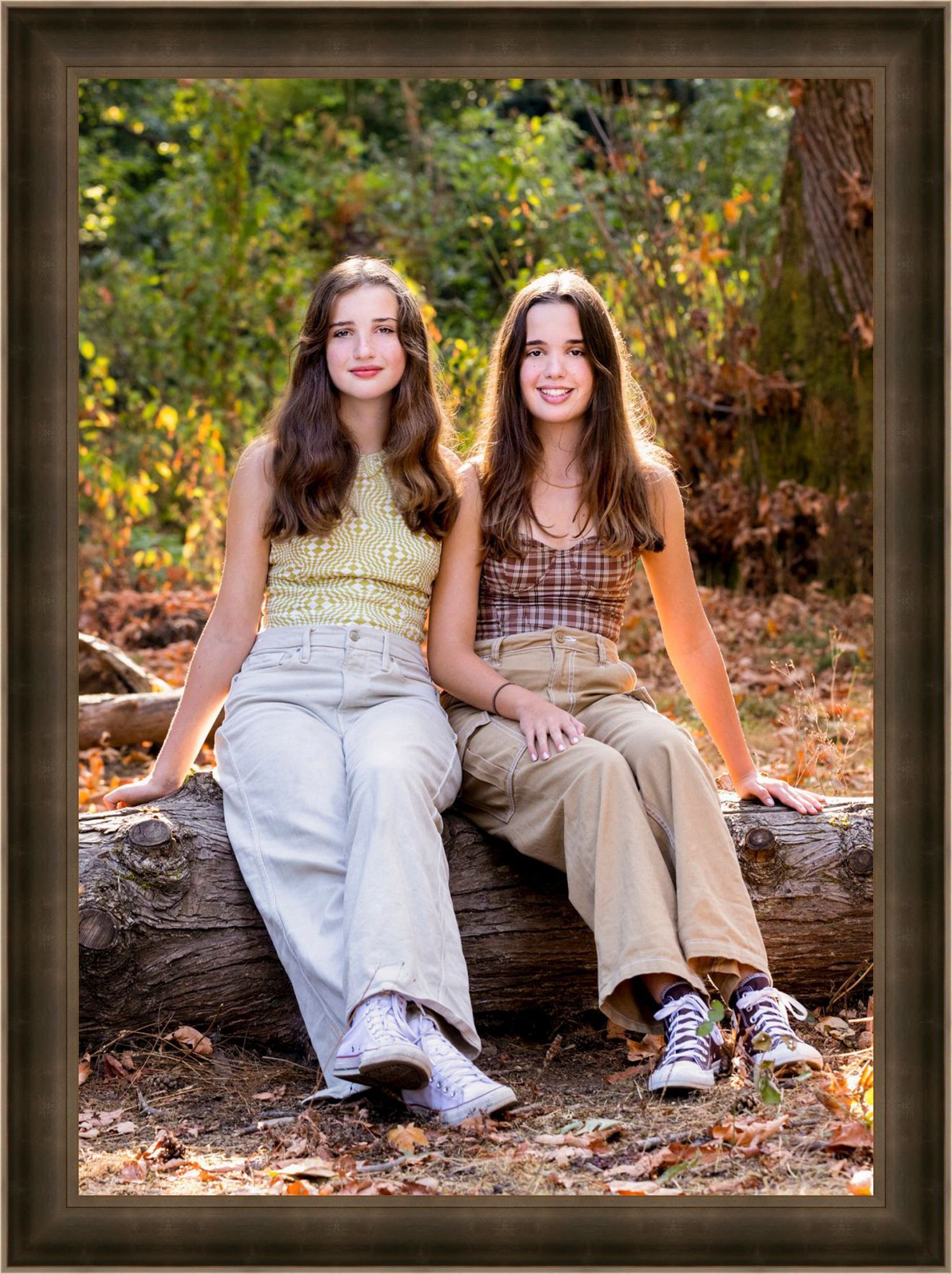 teenage sisters in the woods in the summer