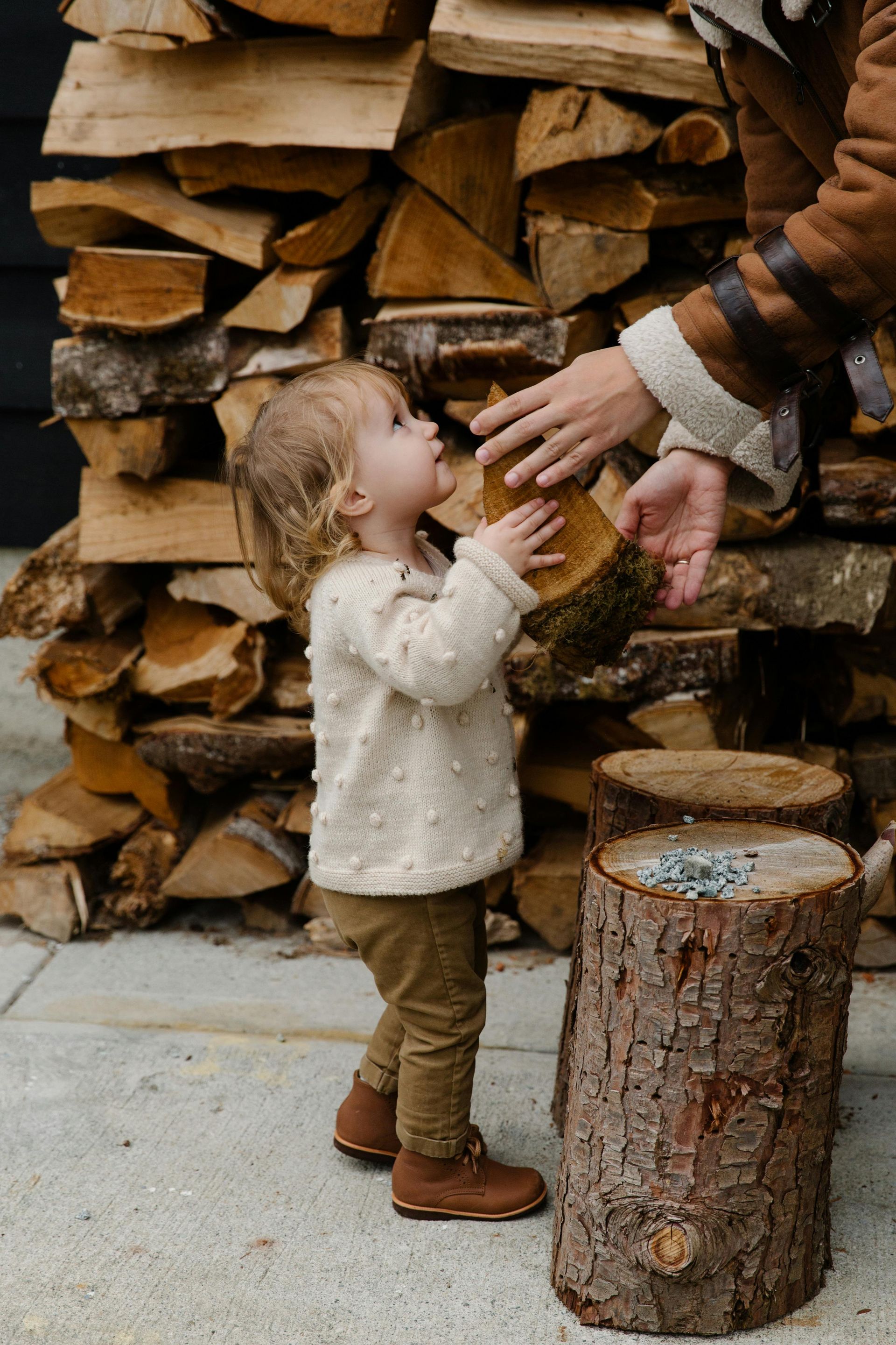 Child participating in kindness activity during outreach