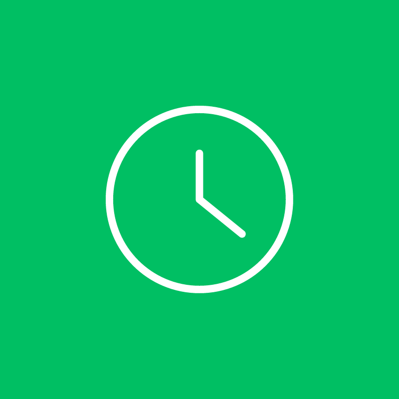 A white clock in a green circle on a green background
