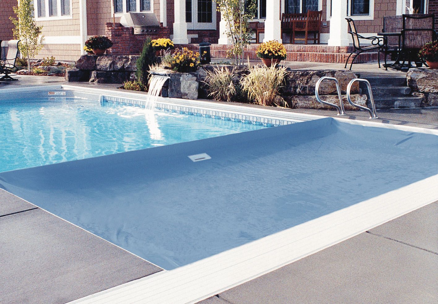 an automatically deployed pool cover