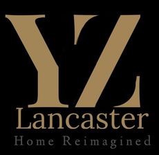 a logo for yz lancaster home reimagined