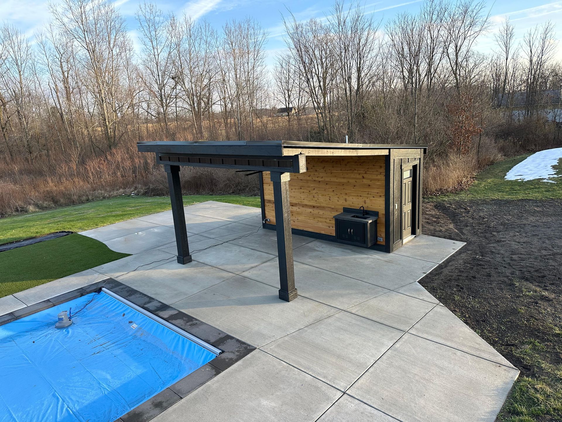 A swimming pool with a staircase leading to it