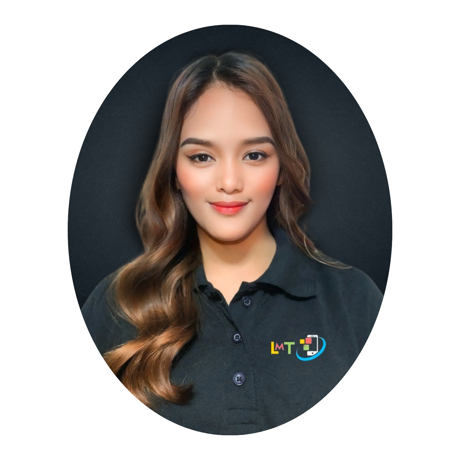 A woman with long brown hair and a black polo shirt smiles. She is in front of a dark background.