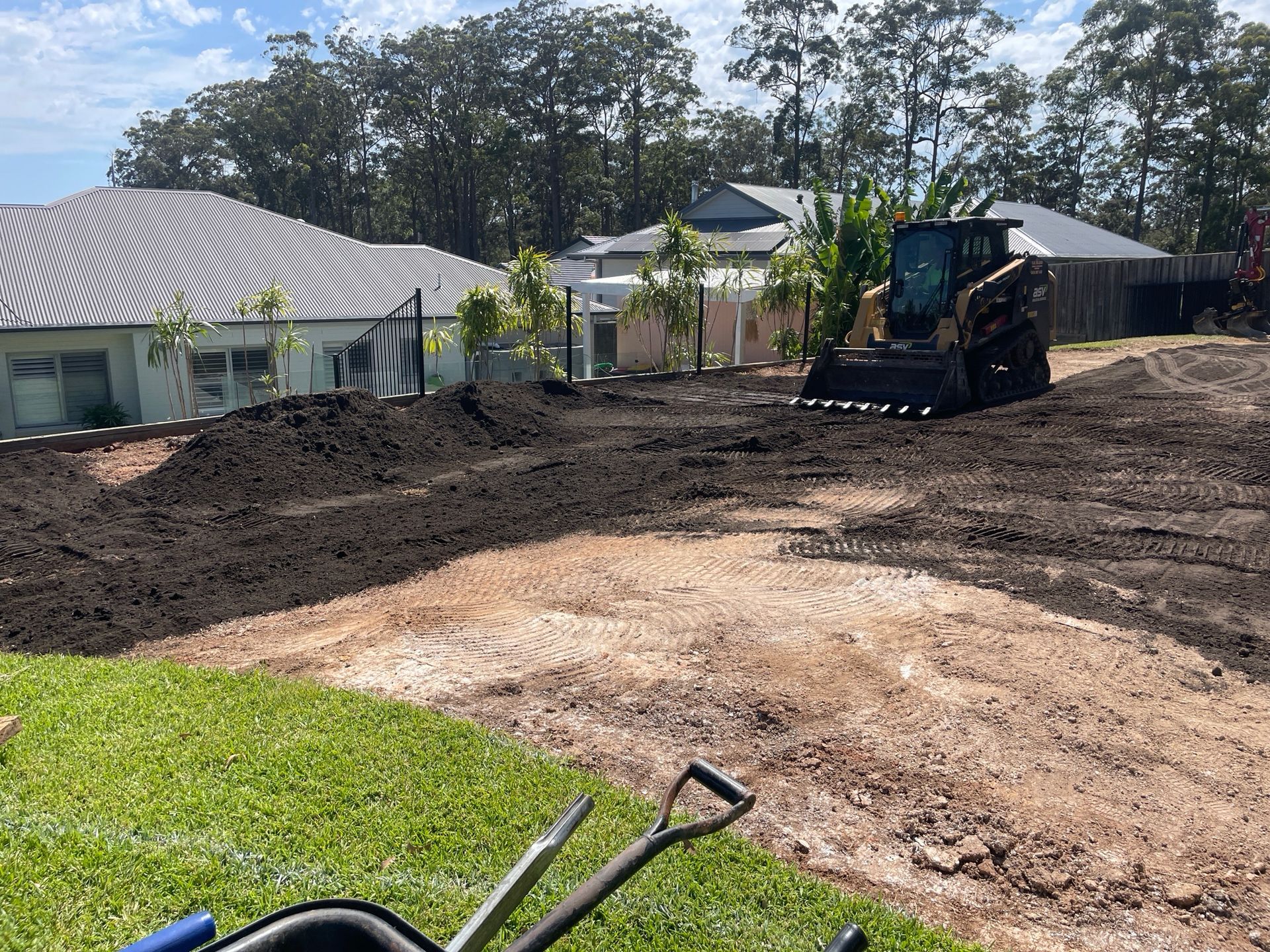 The Team member returfing property — Greener Gardens Gardening Service In Thrumster, NSW