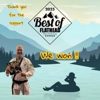 Man holding award, with logo