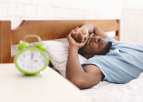 Man in Bed Suffering from Insomnia — Fredericksburg, VA — Central Virginia Sleep Center