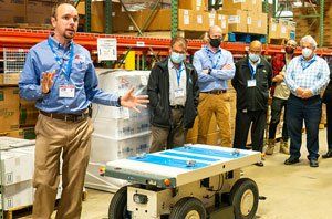 A&M Industrial staff demonstrating advanced tools, representing innovation, creativity, and future-minded company culture