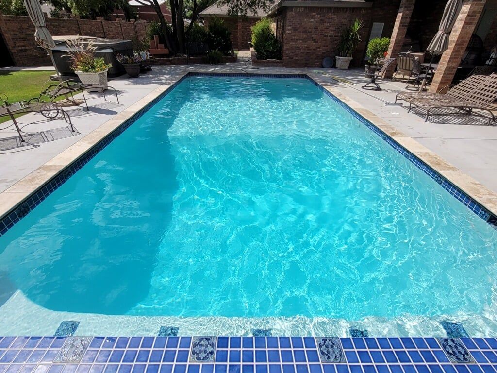 Large Swimming Pool Filled With Blue Water