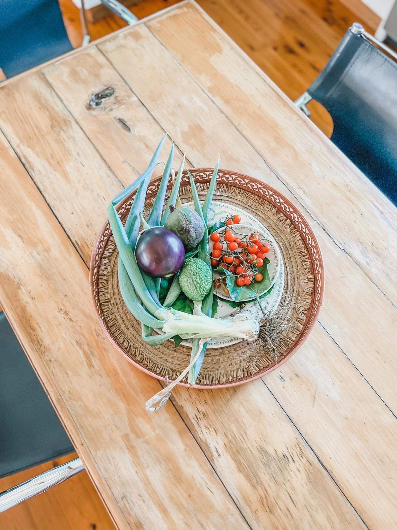 Various botanicals: purple fruit, red berries, green plants. Norfolk Island Trade Winds Seniors Sanctuary