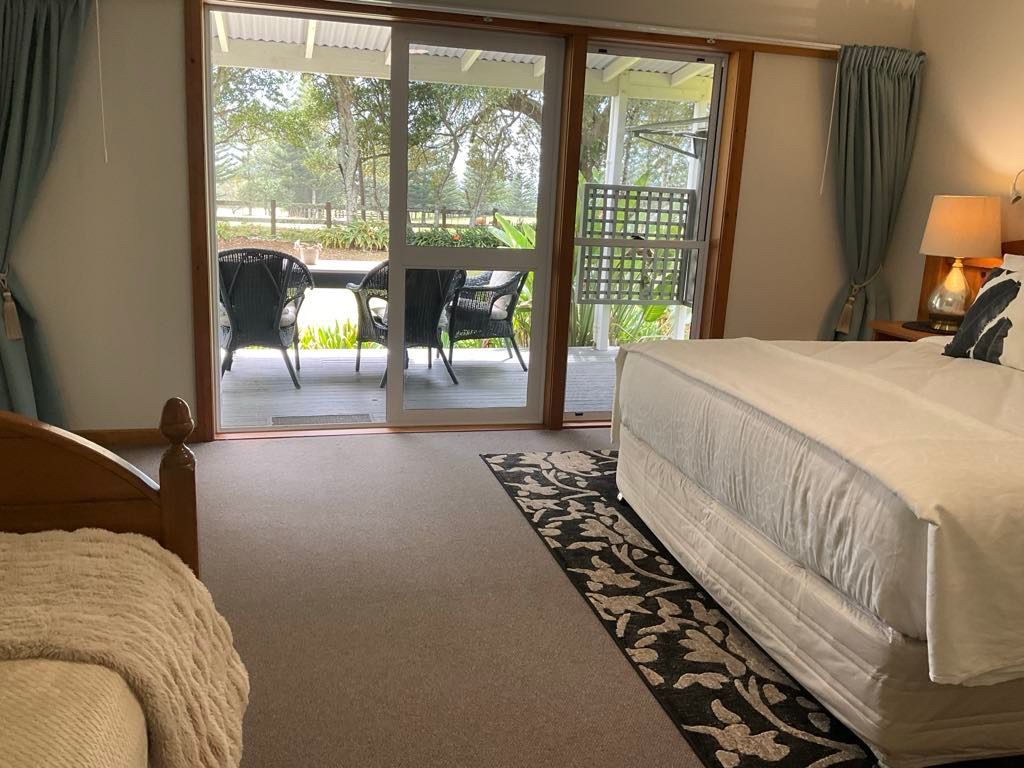 Patio door opening to outdoor seating. Norfolk Island Trade Winds Seniors Sanctuary Flinders