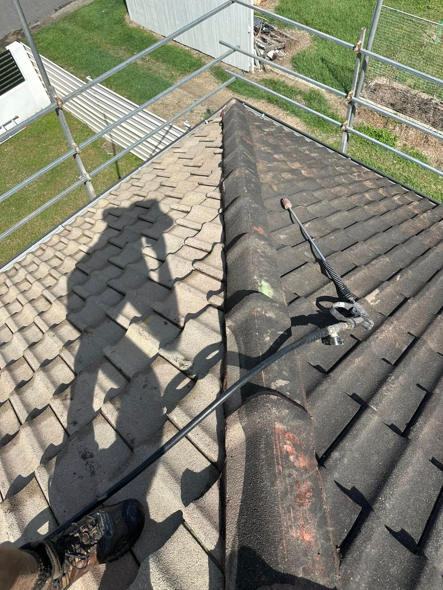 Roof Cleaning, Half Completed. Pressure Washer on Dirty Tiles, Shadow of Person — Roof Tek CQ in Rockhampton, QLD
