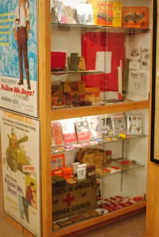 A display case of a number of scouting memorabilia items