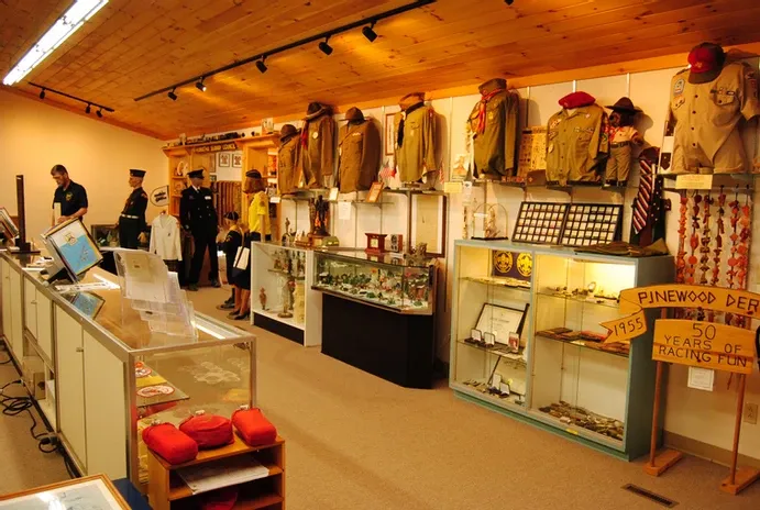 A wall of scouting clothes and other memorabilia