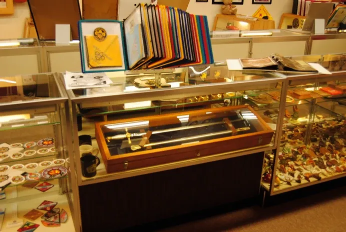 Glass display case containing a sword