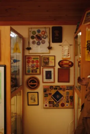 A wall with scouting items hung up