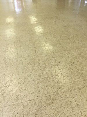 A close up of a tiled floor in a room.