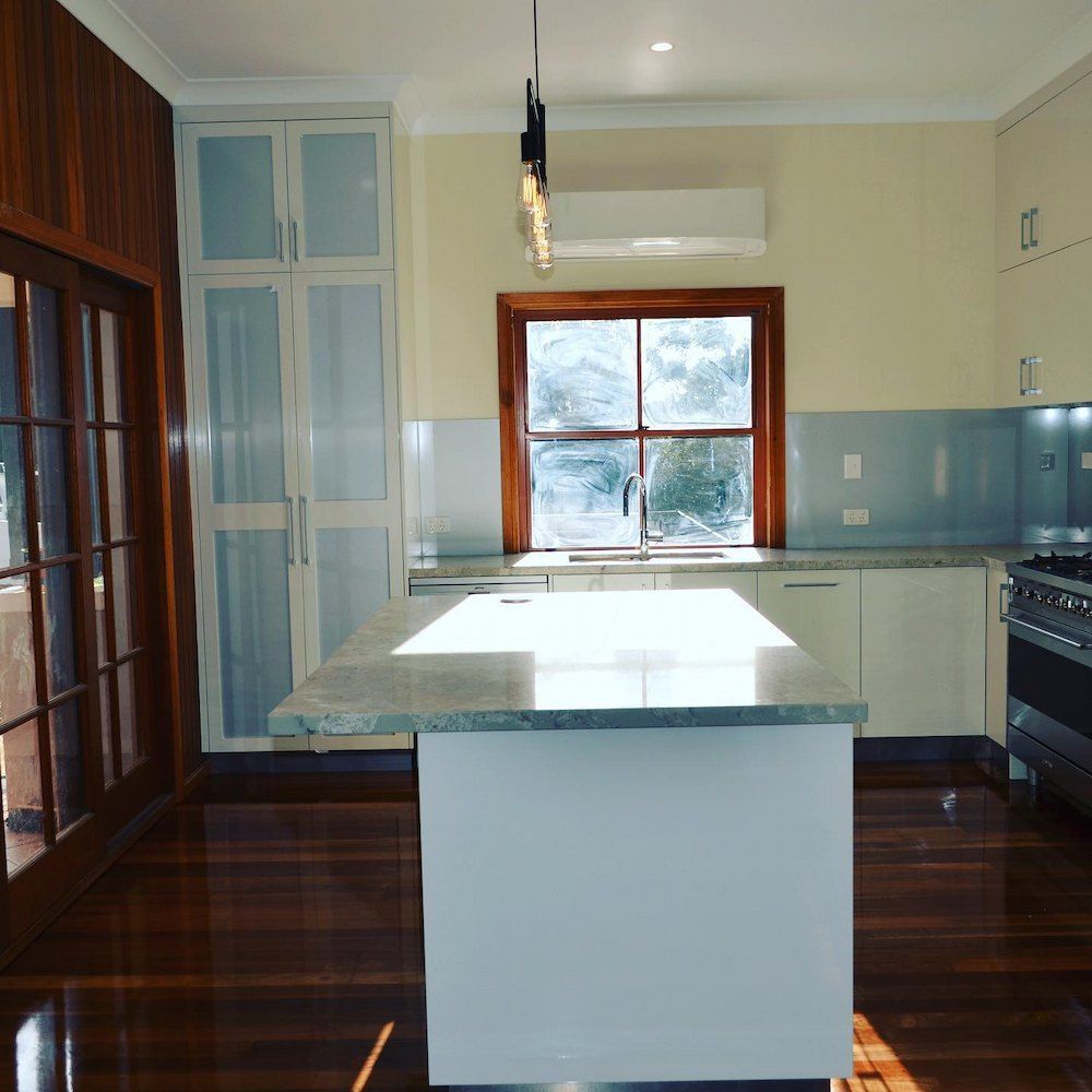 A Kitchen With A Large Island And A Window — Alstonville Kitchens In Alstonville, NSW