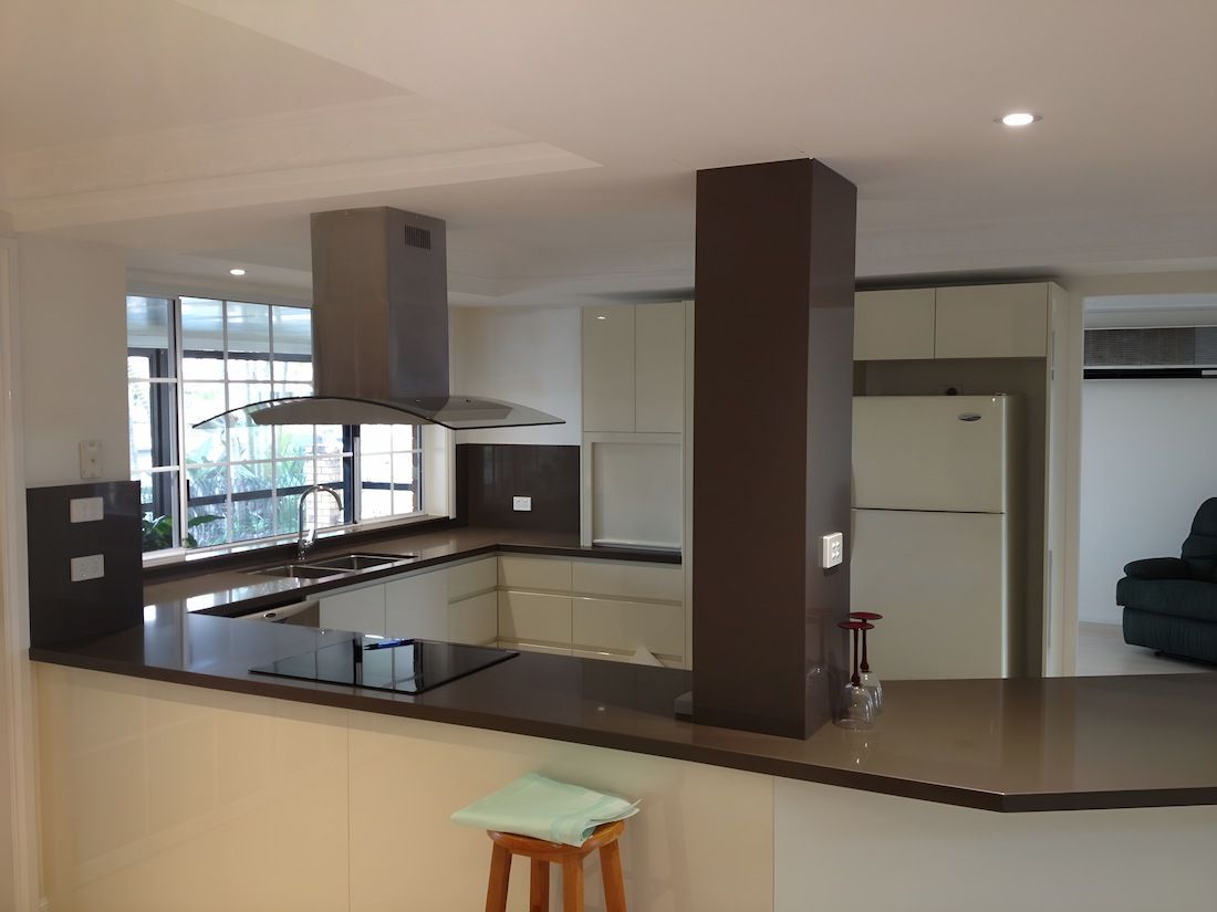 A Kitchen With A Stove Top Oven And A Refrigerator — Alstonville Kitchens In Alstonville, NSW